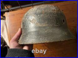 WW2 german helmet stalingrad dig, winter camo visible partial decal
