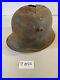 WWI-or-WWII-German-foot-soldier-helmet-bullet-holes-ww1-ww2-world-war-11B55-01-ci