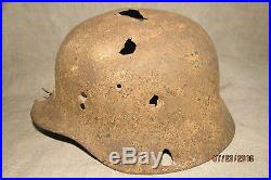 WWII German Battle Damaged M40 Helmet. Battlefield Relic