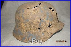 WWII German Battle Damaged M40 Helmet. Battlefield Relic