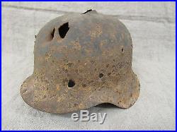 WWII German Battlefield Relic Helmet. M40 Battle damaged