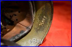 WWII German Helmet M35 In the original paint and with the native liner