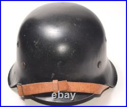 WWII German M42 ET64 Helmet with Original Split Pins, Post-War Black Czech Refit WWII German M42 ET64 Helmet with Original Split Pins, Post-War Black Czech Refit