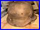 WWII-German-foot-soldier-helmet-bullet-shrapnel-hole-WWII-WW2-world-war-01-bxr