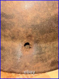 WWII German foot soldier helmet bullet shrapnel hole WWII WW2 world war