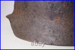 WWII WW2 German soldier M35 Helmet with battle damaged from Kurland #152 WWII WW2 German soldier M35 Helmet with battle damaged from Kurland #152