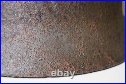 WWII WW2 German soldier M35 Helmet with battle damaged from Kurland #152 WWII WW2 German soldier M35 Helmet with battle damaged from Kurland #152