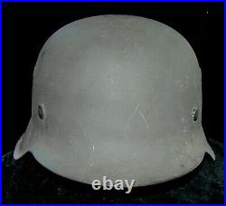 World war two Vet bring back, German Helmet from the Store Room never used m